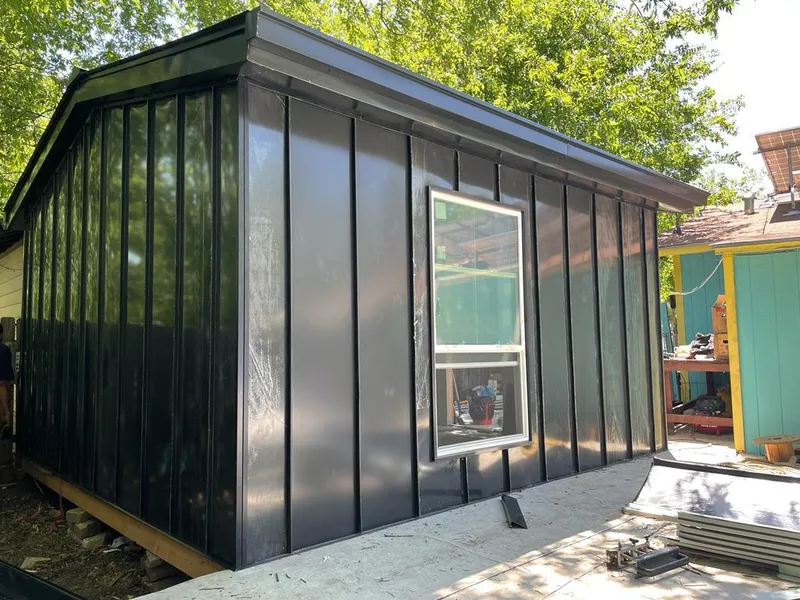 Black standing seam metal wall panels for Roof Inspection in Willistown